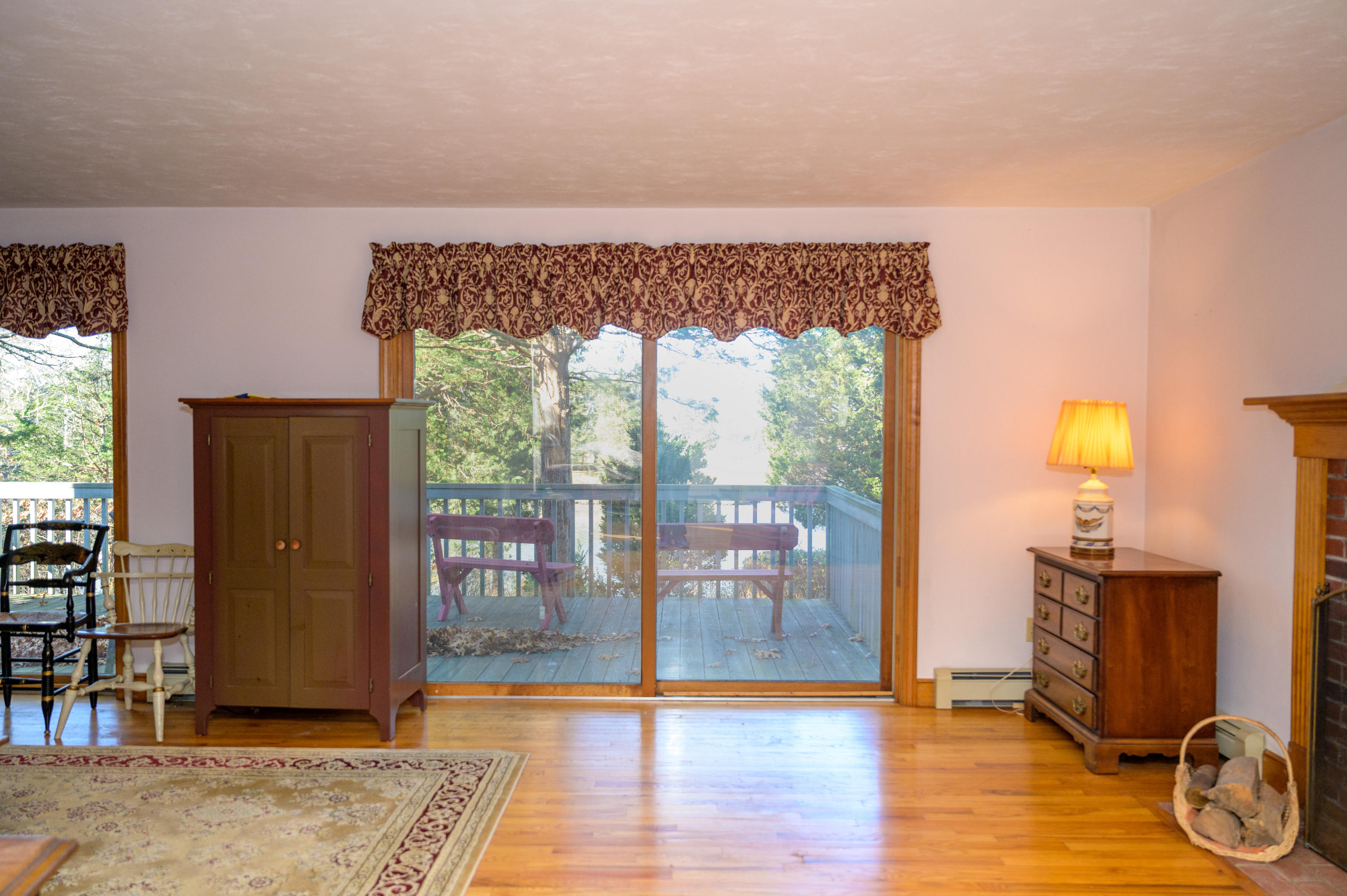 18 Warren Road Bourne, MA 02532 - Photo 19 of 36 a view of a livingroom with wooden floor and a couch