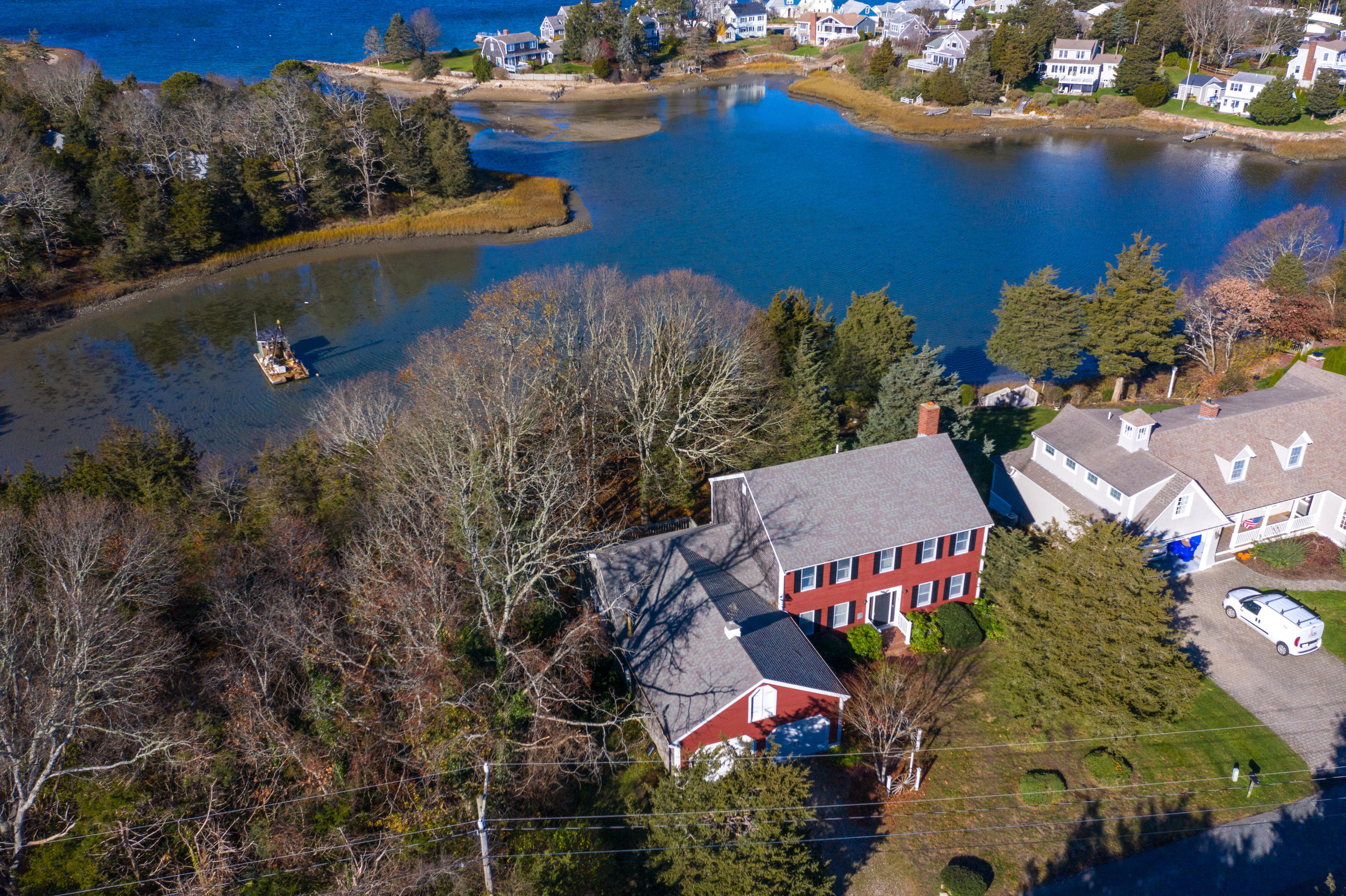18 Warren Road Bourne, MA 02532 - Photo 2 of 36 an aerial view of a house with a lake view