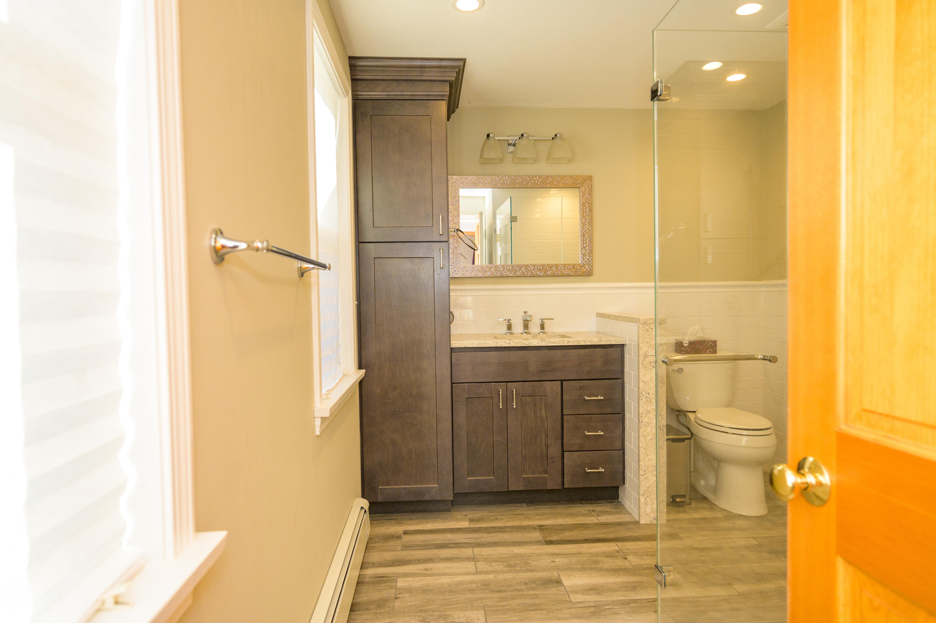 18 Warren Road Bourne, MA 02532 - Photo 22 of 36 a bathroom with a sink a toilet and shower