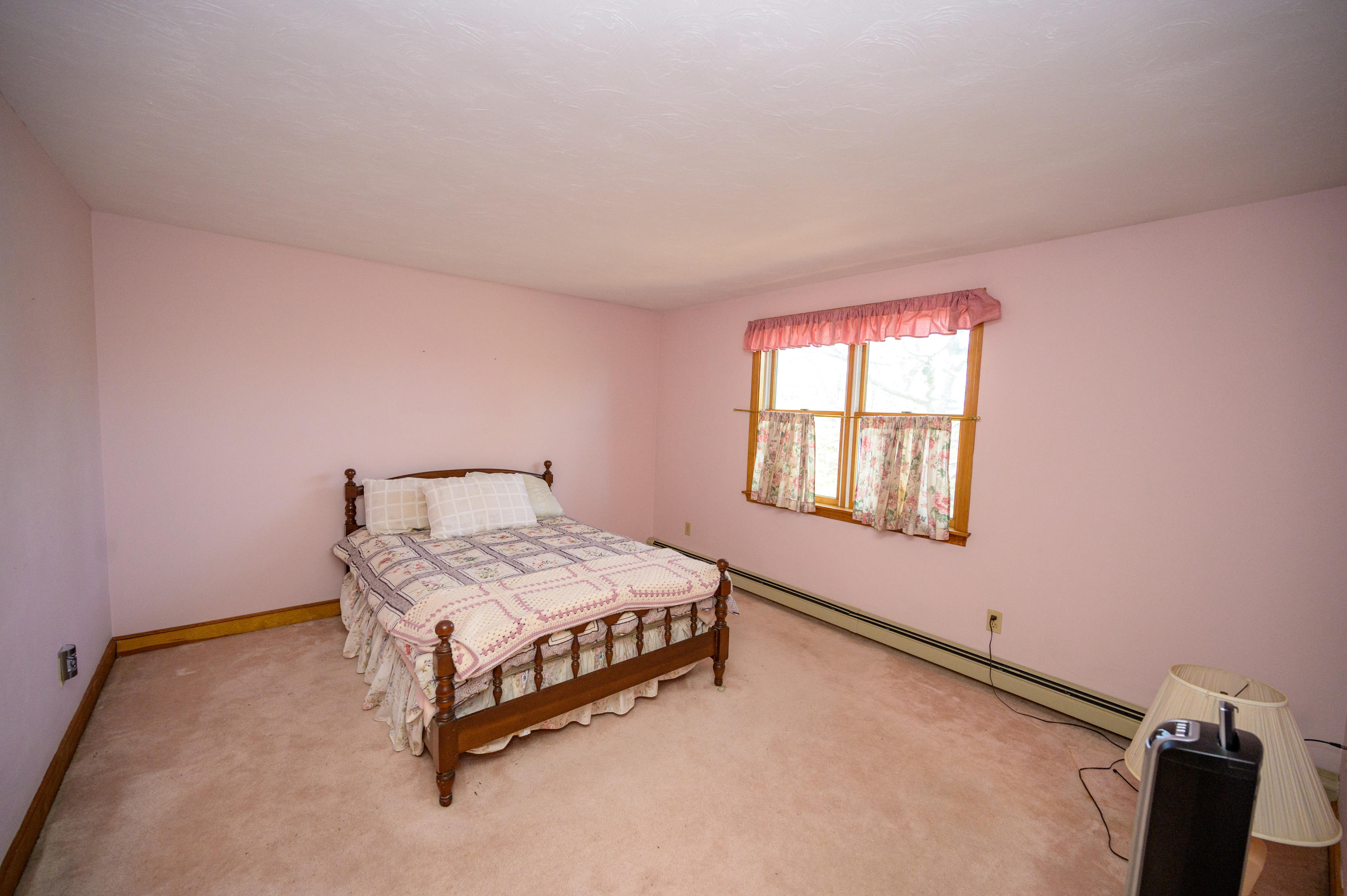 18 Warren Road Bourne, MA 02532 - Photo 29 of 36 a bedroom with a bed and window