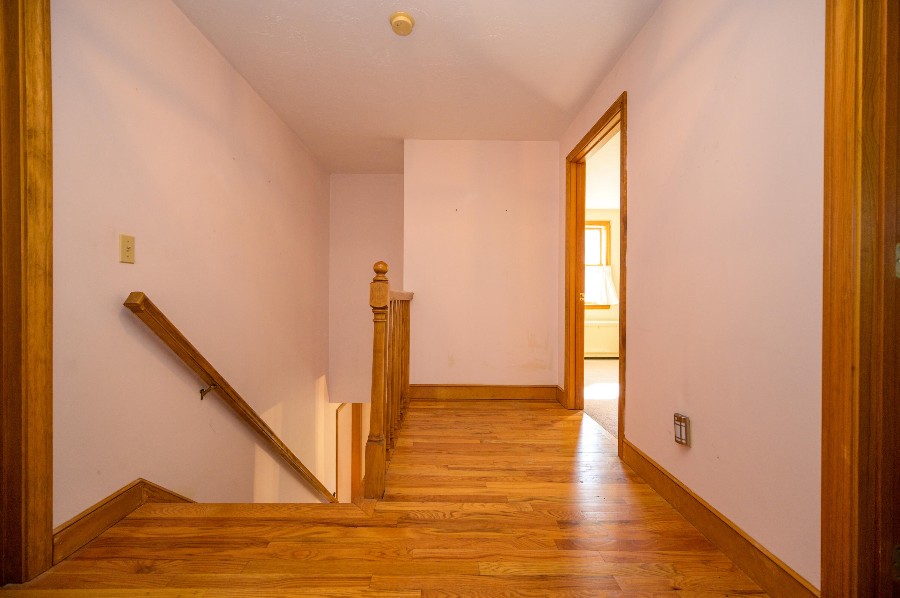 18 Warren Road Bourne, MA 02532 - Photo 30 of 36 a view of an empty room with wooden floor and a window