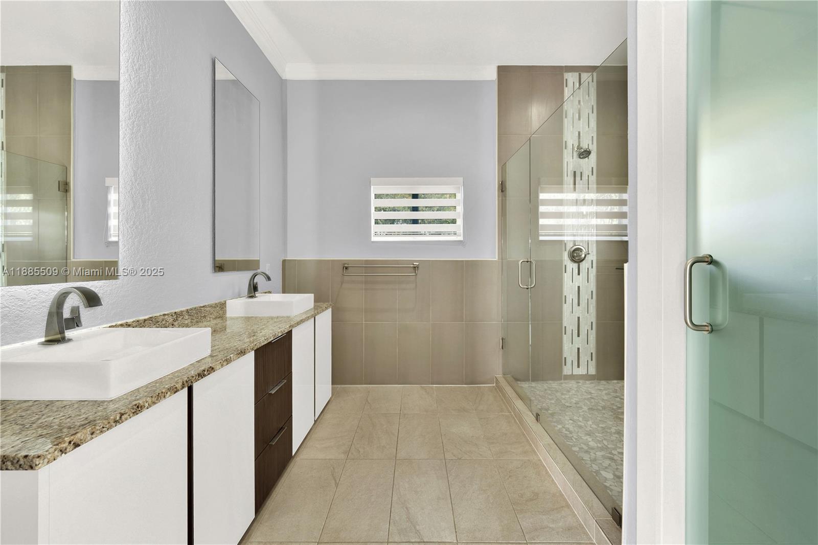 11921 Southwest 82nd Road Miami, FL 33156 - Photo 15 of 42 a bathroom with a granite countertop sink a mirror and a