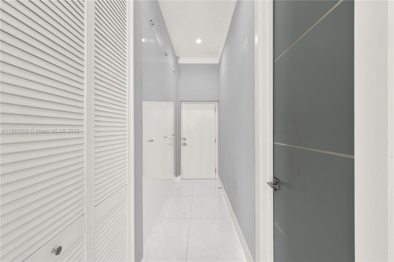 11921 Southwest 82nd Road Miami, FL 33156 - Photo 18 of 42 a view of a hallway with a white door