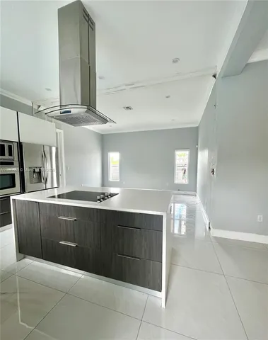 a view of kitchen and sink