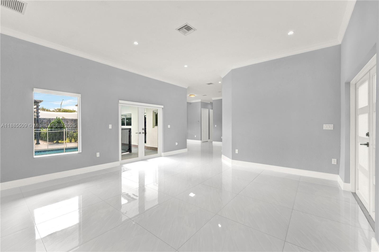 11921 Southwest 82nd Road Miami, FL 33156 - Photo 5 of 42 a view of an empty room with a window