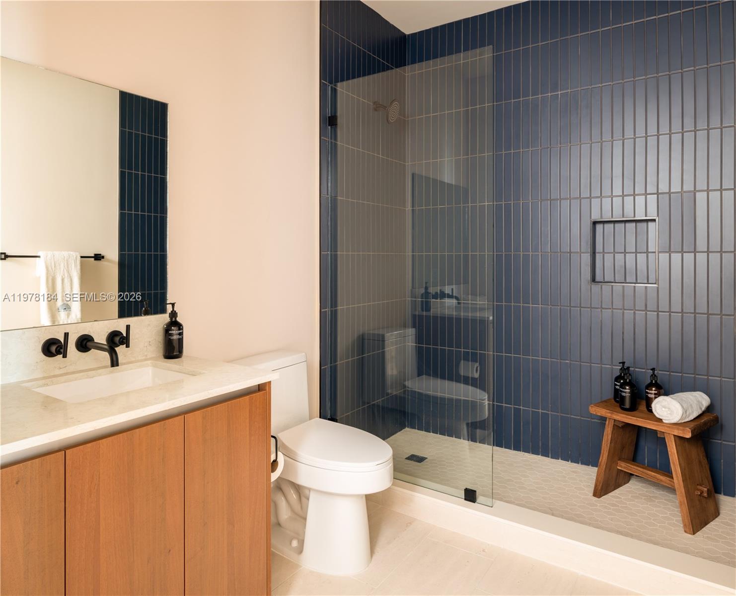 275 Southwest 6th Street, Unit 507 Miami, FL 33130 - Photo 4 of 19 a bathroom with a sink a toilet and shower