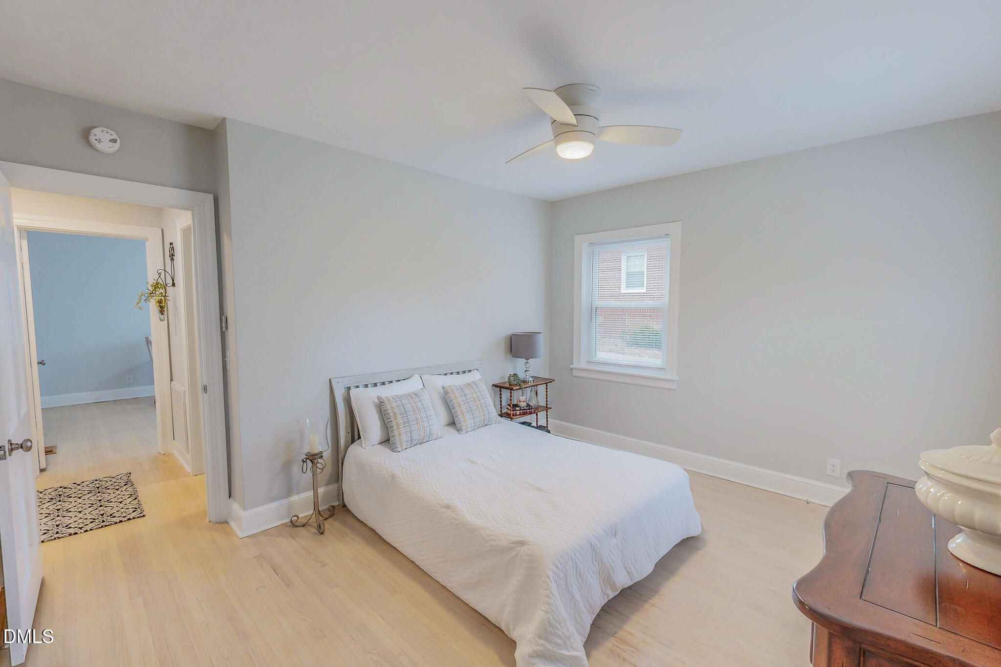 421 Gordon Street Roxboro, NC 27573 - Photo 25 of 40 a bedroom with a bed and a window