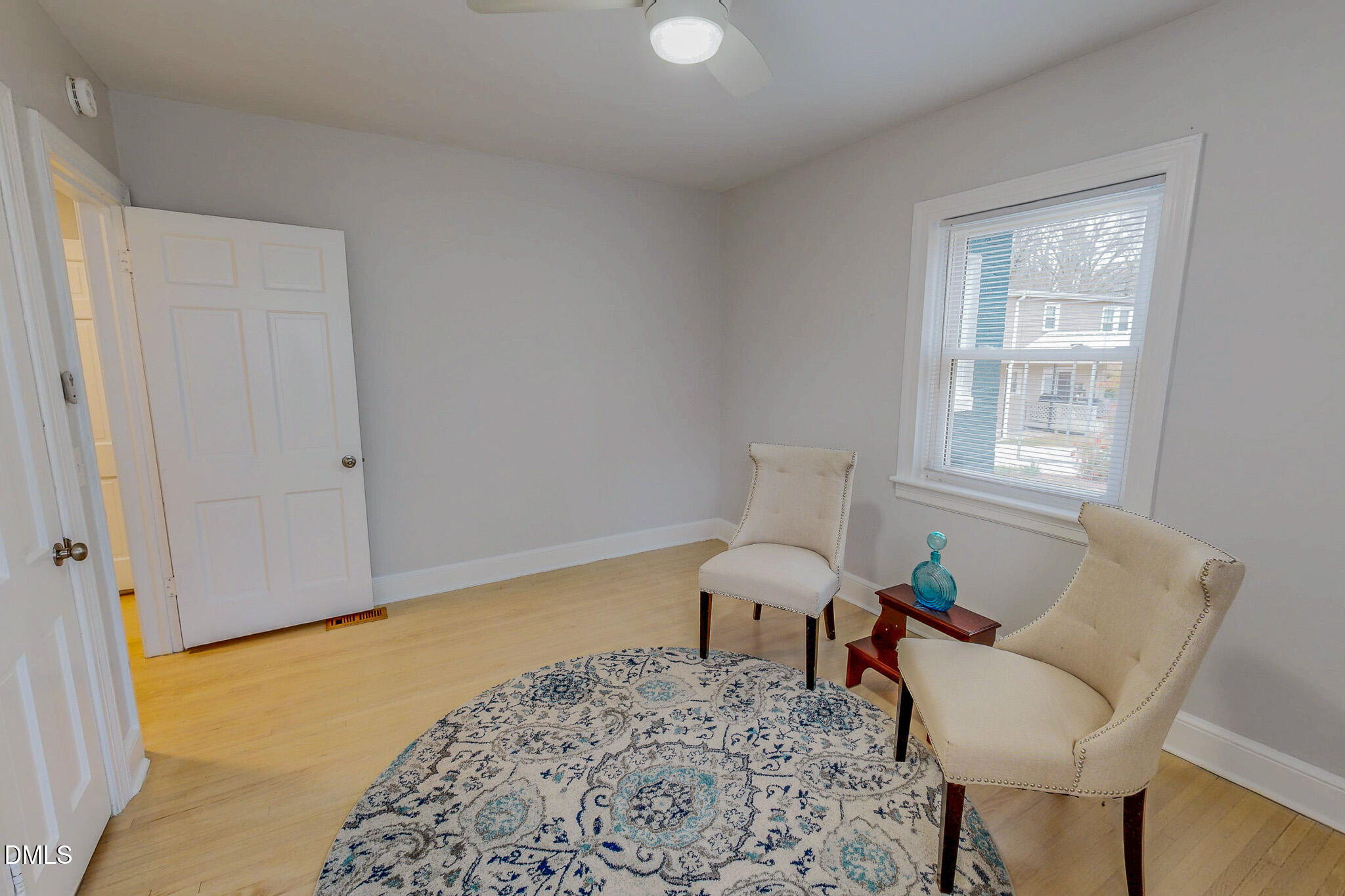 421 Gordon Street Roxboro, NC 27573 - Photo 27 of 40 a living room with furniture and a window