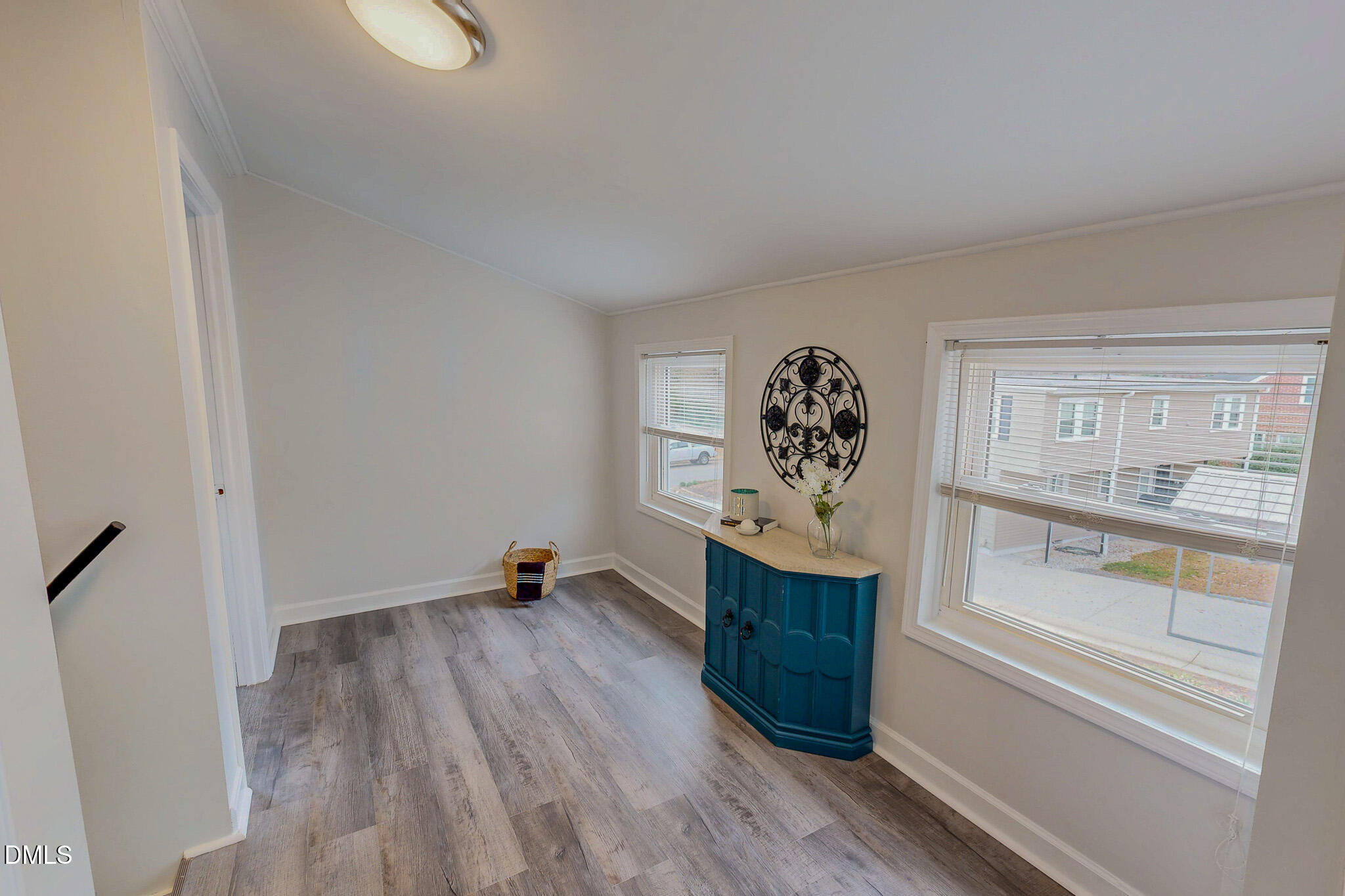 421 Gordon Street Roxboro, NC 27573 - Photo 35 of 40 a view of a hallway with wooden floor and entryway