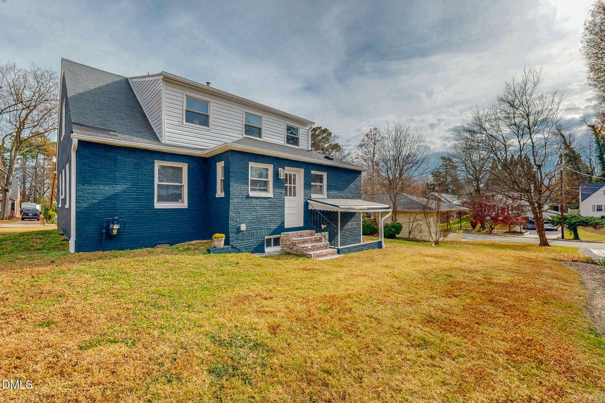 421 Gordon Street Roxboro, NC 27573 - Photo 8 of 40 a front view of a house with a yard