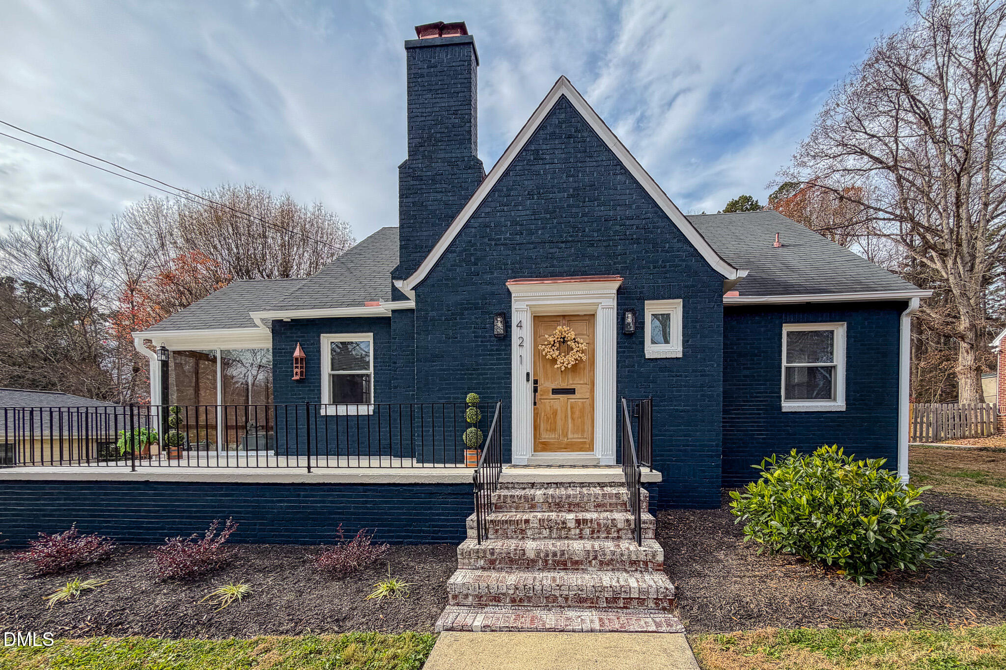 421 Gordon Street Roxboro, NC 27573 - Photo 9 of 40 a front view of a house with garden