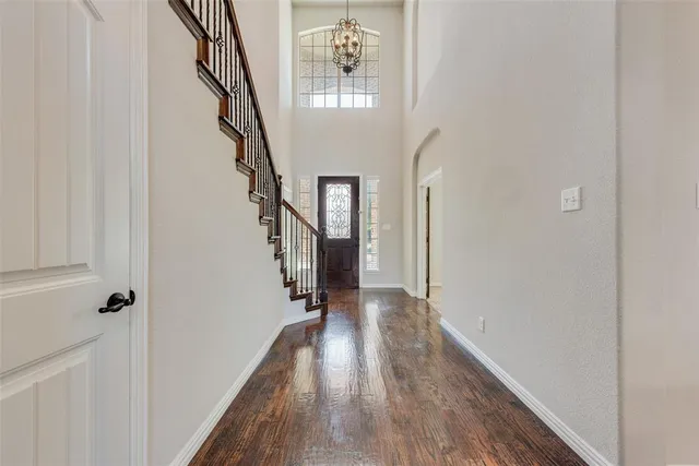a view of entryway with wooden floor