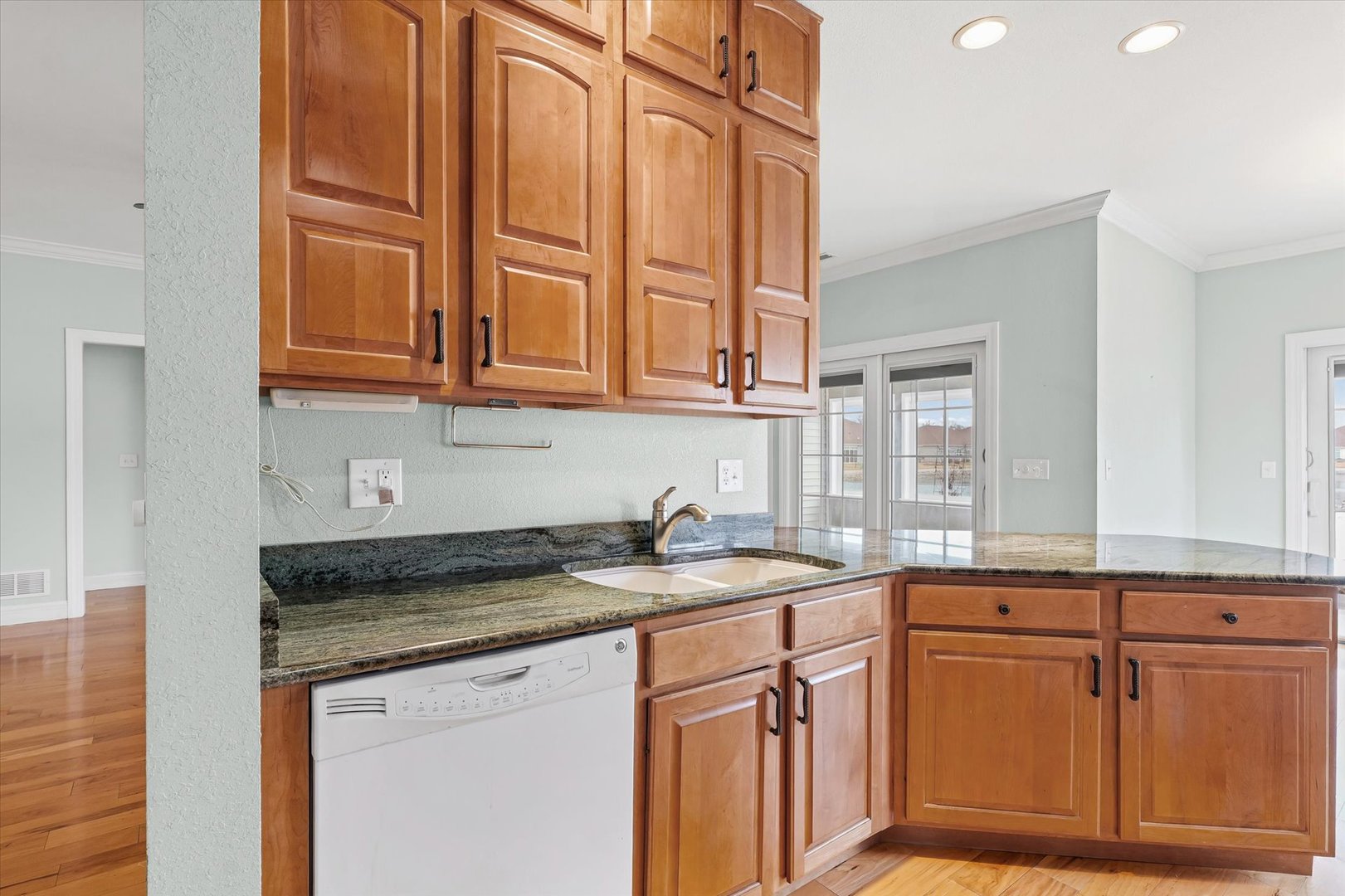 1908 S Prairie Urbana, IL 61802 - Photo 14 of 32 a kitchen with granite countertop cabinets and window