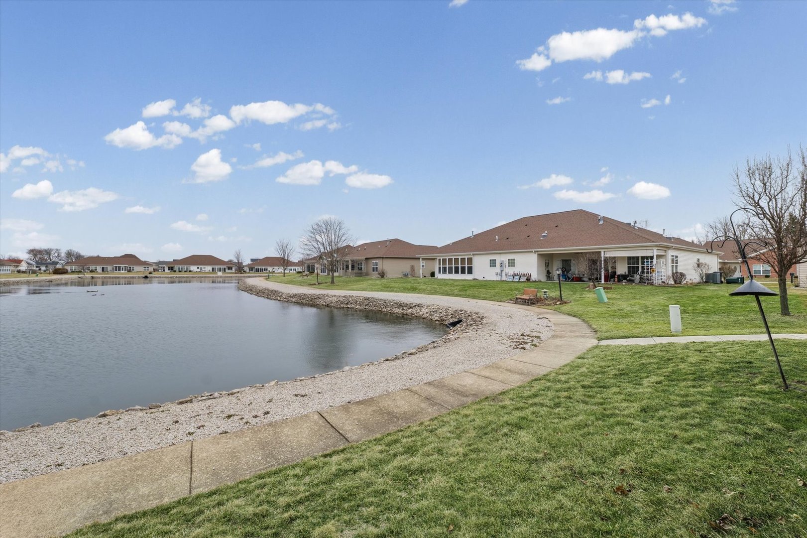 1908 S Prairie Urbana, IL 61802 - Photo 30 of 32 a view of a lake with a big yard