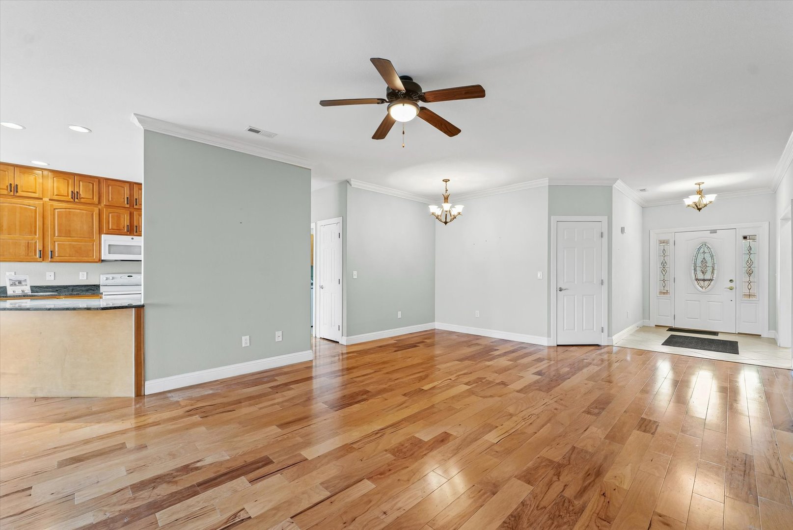 1908 S Prairie Urbana, IL 61802 - Photo 8 of 32 a view of empty room with wooden floor and window