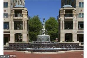 1711 Ascot Way, Unit B Reston, VA 20190 - Photo 12 of 13 a front view of a building with street