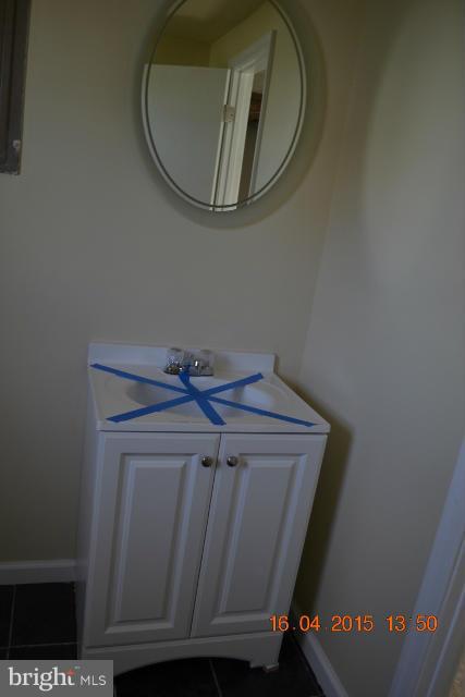 9 Rollwin Road Baltimore, MD 21244 - Photo 3 of 10 Basement half bath
