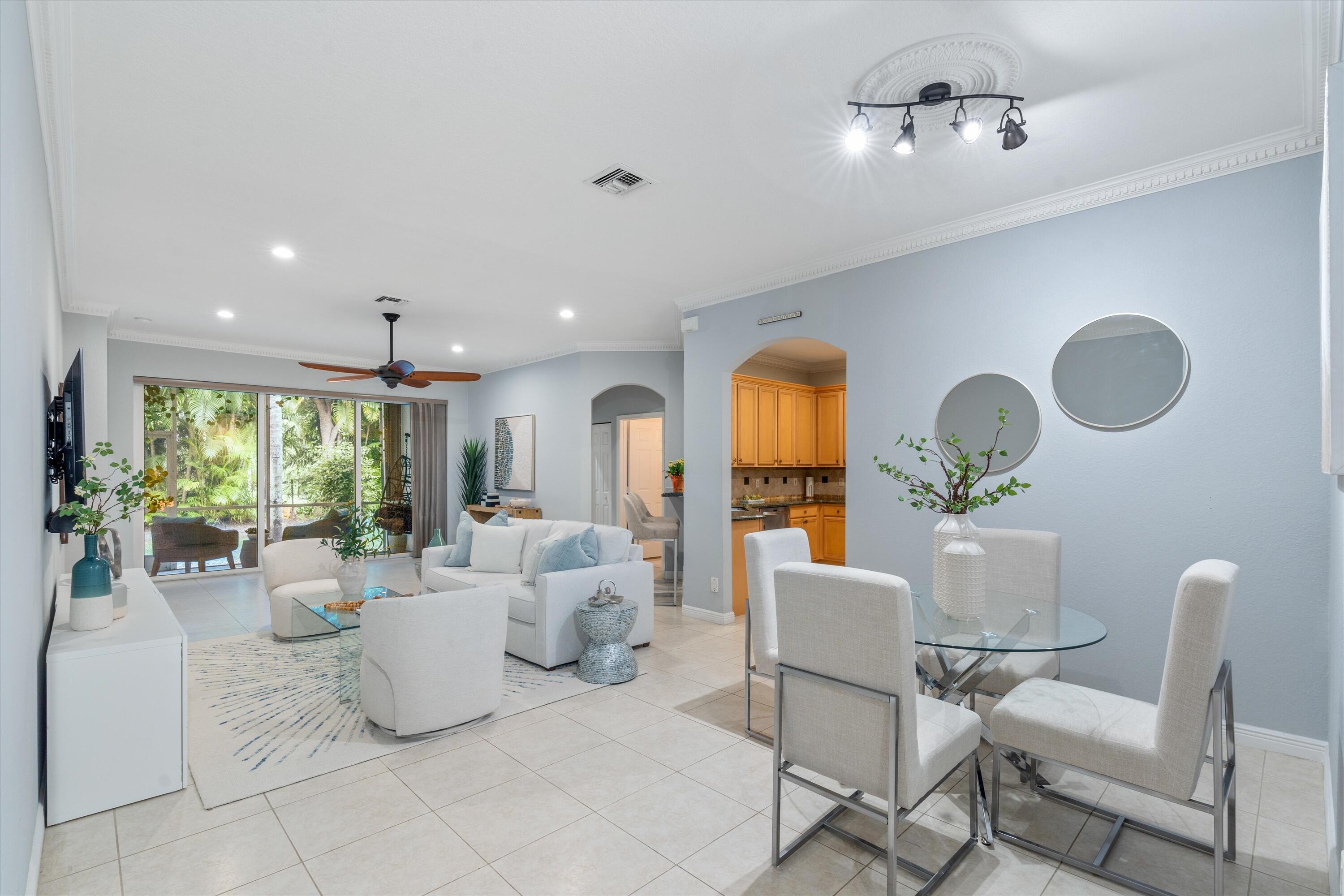 16055 Sims Road, Unit 103 Delray Beach, FL 33484 - Photo 13 of 60 Open Living & Dining with Patio Access