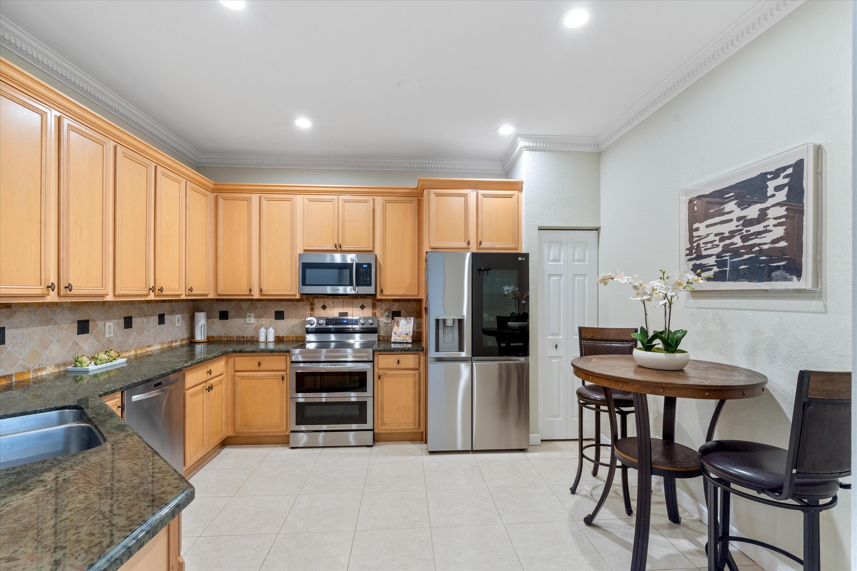 16055 Sims Road, Unit 103 Delray Beach, FL 33484 - Photo 14 of 60 Modern Kitchen with Ample Cabinet Space