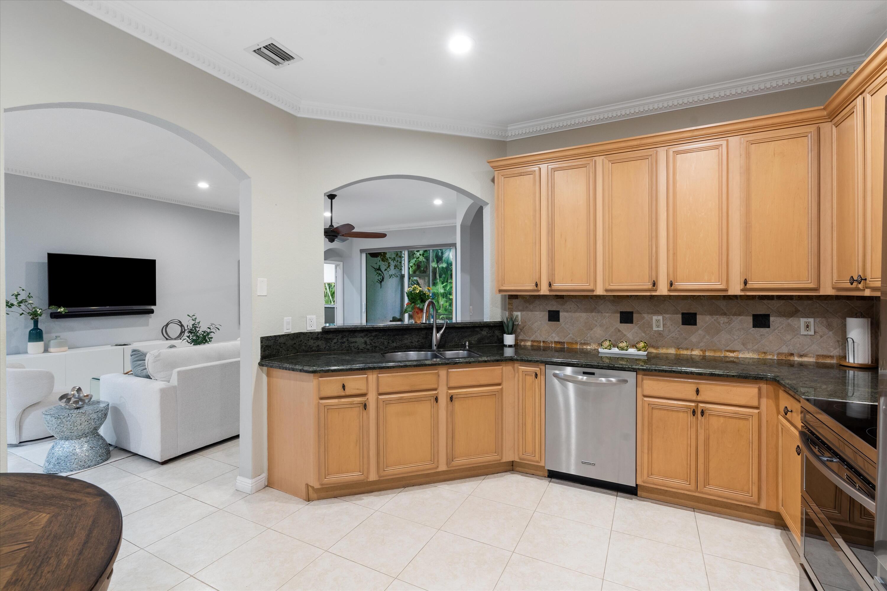 16055 Sims Road, Unit 103 Delray Beach, FL 33484 - Photo 16 of 60 Kitchen Overlooking Living Area