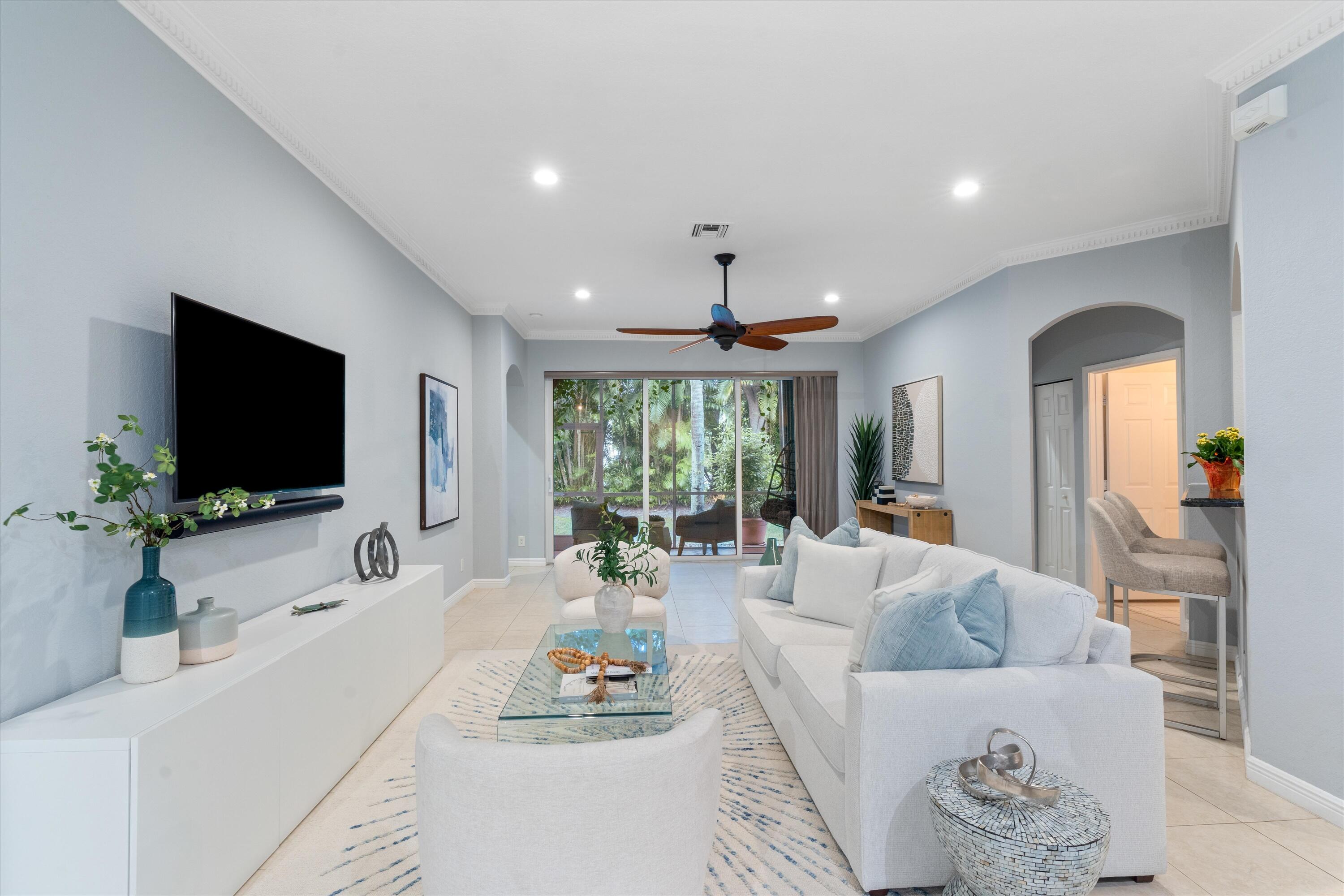 16055 Sims Road, Unit 103 Delray Beach, FL 33484 - Photo 9 of 60 Elegant Living Room with Patio View
