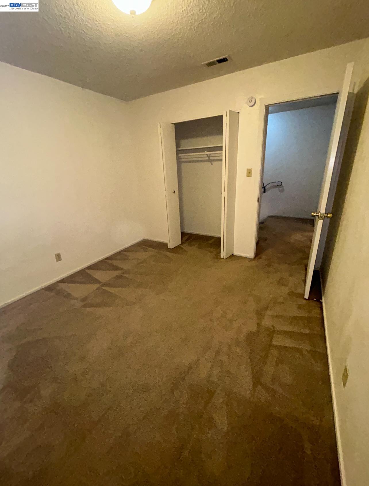 902 F Street Davis, CA 95616 - Photo 19 of 28 an empty room with an entrance to other room