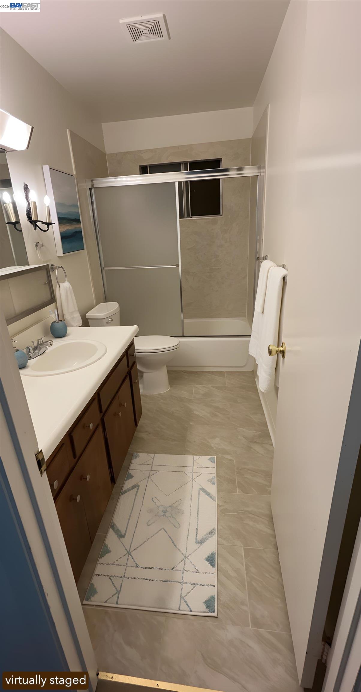 902 F Street Davis, CA 95616 - Photo 20 of 28 a bathroom with a sink and mirror
