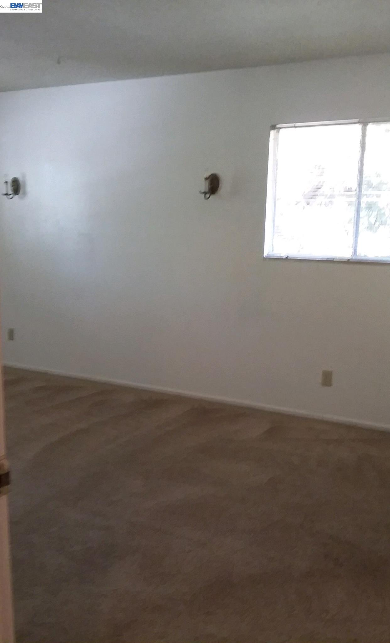 902 F Street Davis, CA 95616 - Photo 25 of 28 a view of an empty room and a window