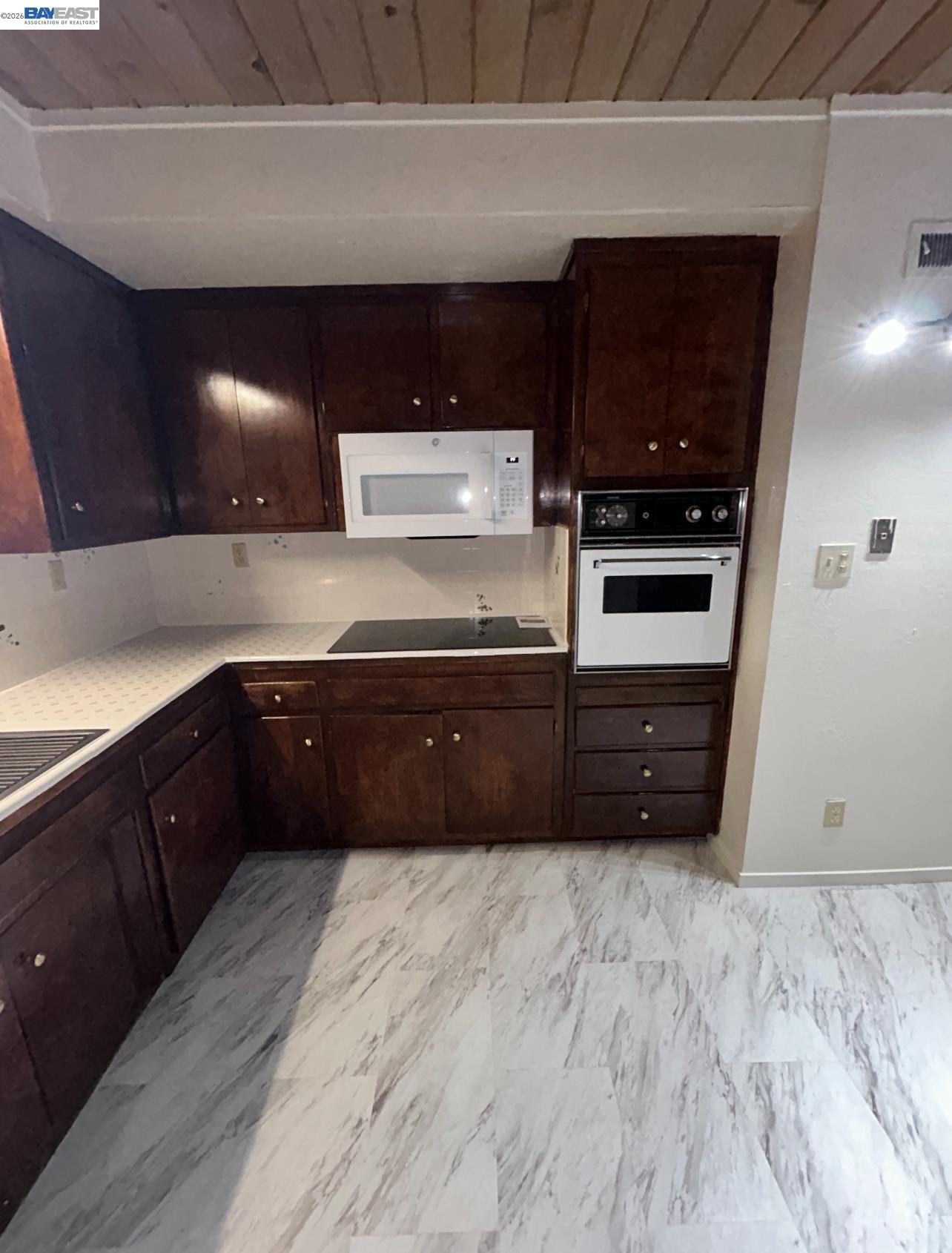 902 F Street Davis, CA 95616 - Photo 6 of 28 a living room with hard wood floors and utility room