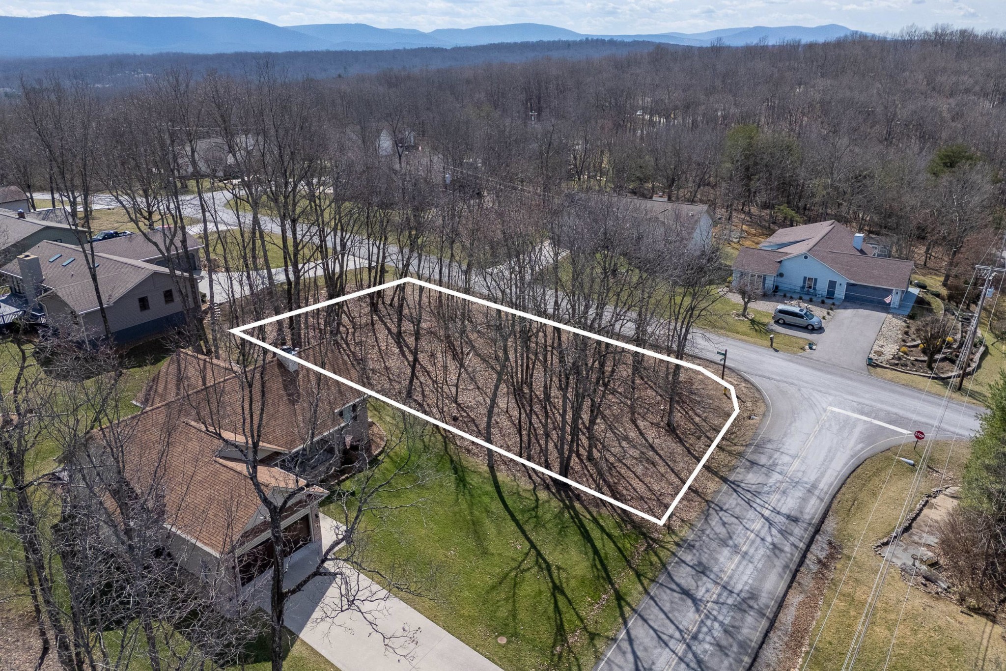 175 Greenwood Road Crossville, TN 38558 - Photo 7 of 14 a view of a roof deck with wooden floor and mountain view