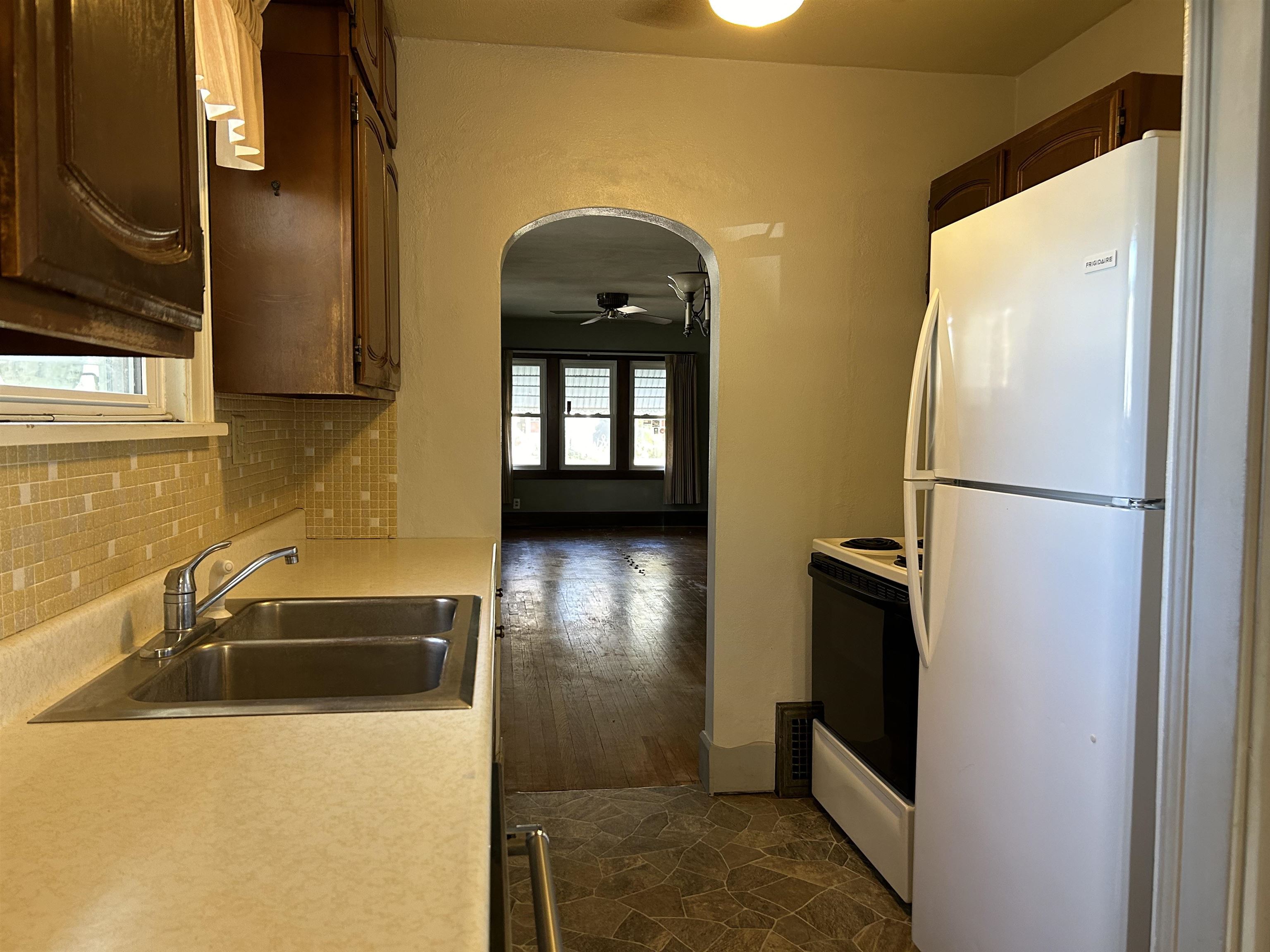 1922 Bruner Street Rockford, IL 61103 - Photo 9 of 18 a bathroom with a sink and a large mirror