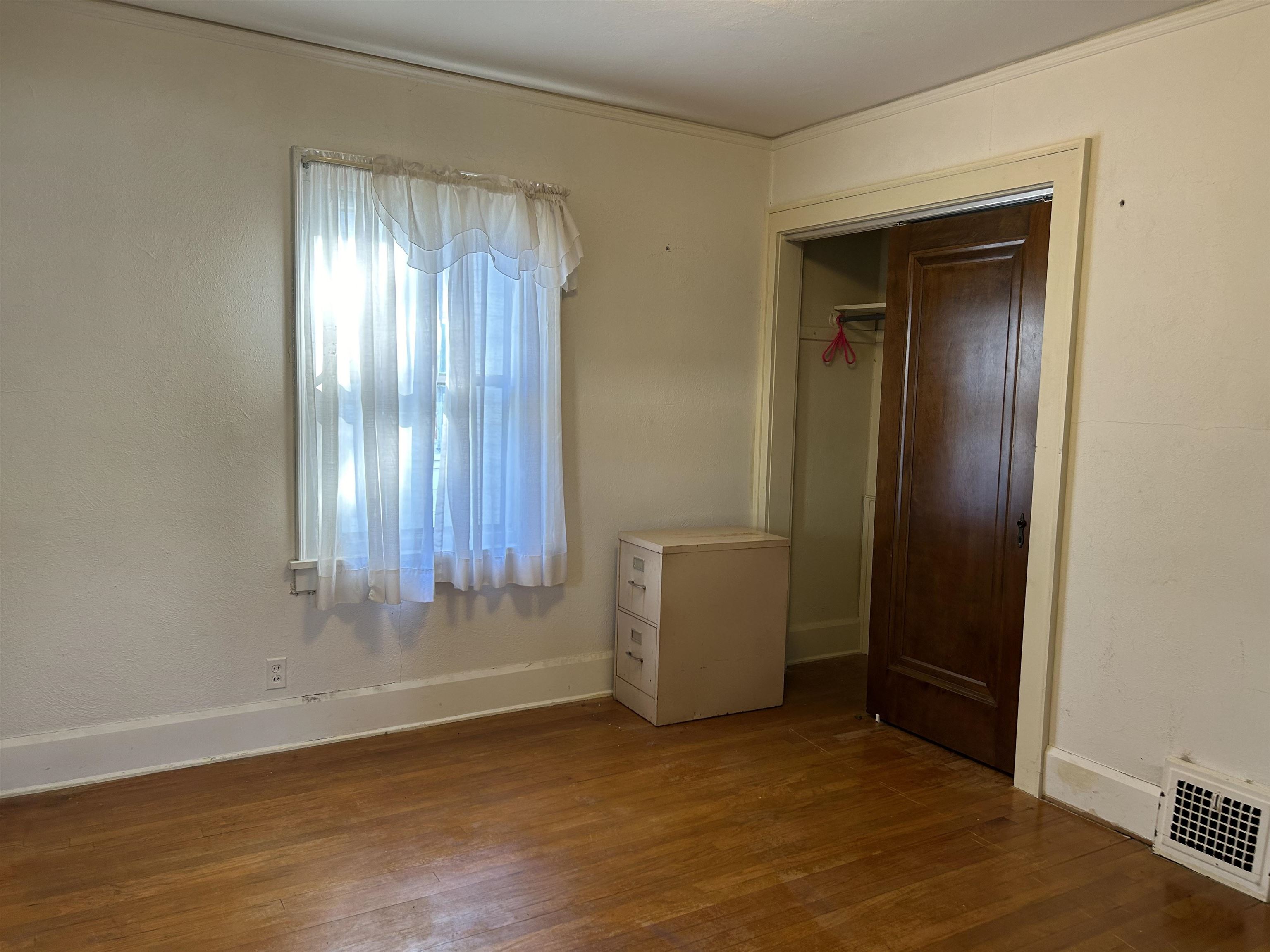 1922 Bruner Street Rockford, IL 61103 - Photo 10 of 18 an empty room with closet and windows