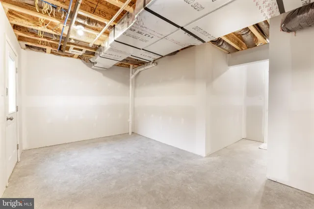 a sign on the wall in front of a building