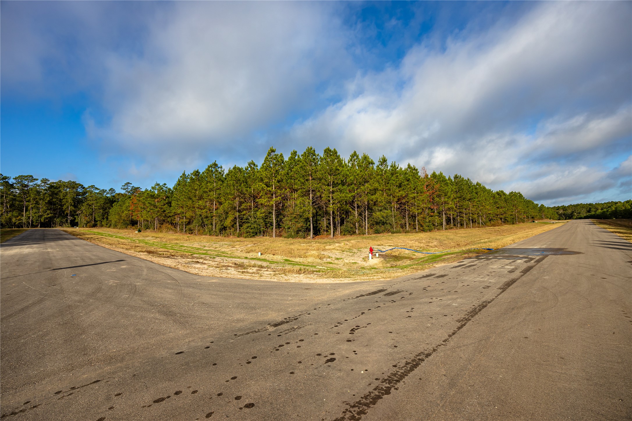 16326 Ridge Oak Road Willis, TX 77378 - Photo 7 of 15 a view of lake view with beach
