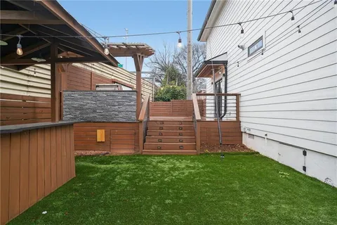 a view of a backyard with plants