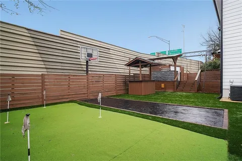 a view of a backyard with a garden