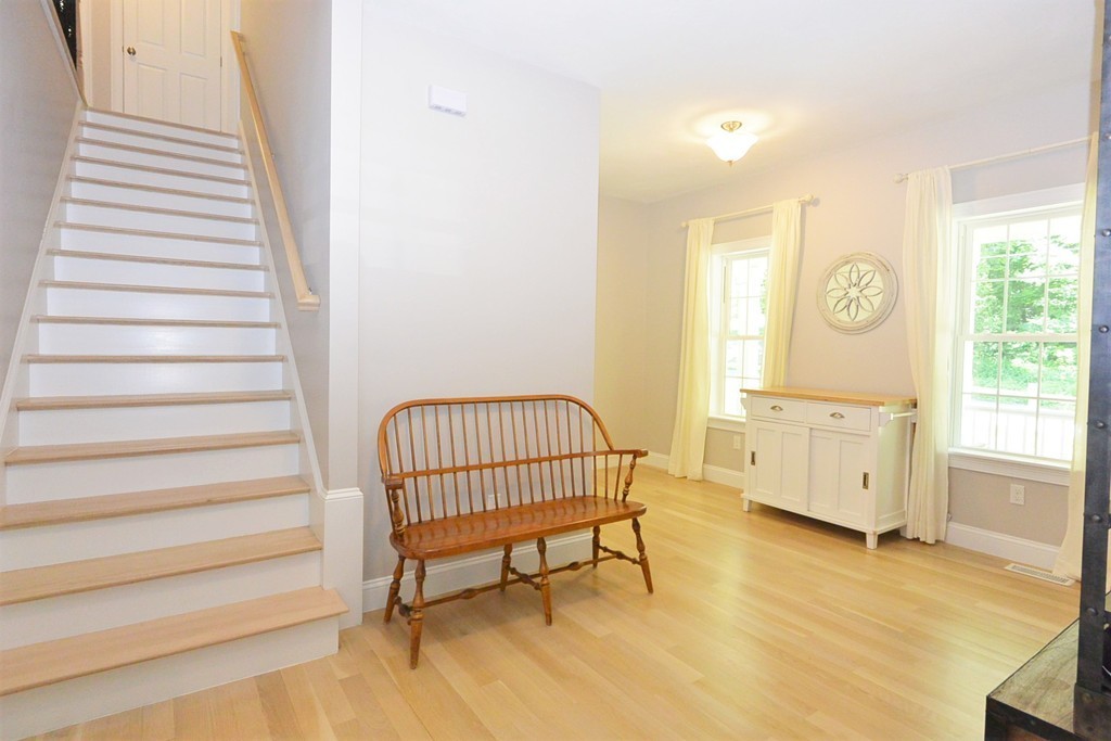 424 Langen Road Lancaster, MA 01523 - Photo 12 of 25 a spacious bedroom with a bed and a window