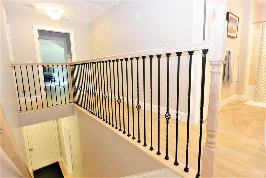 424 Langen Road Lancaster, MA 01523 - Photo 13 of 25 a view of a hallway with a door