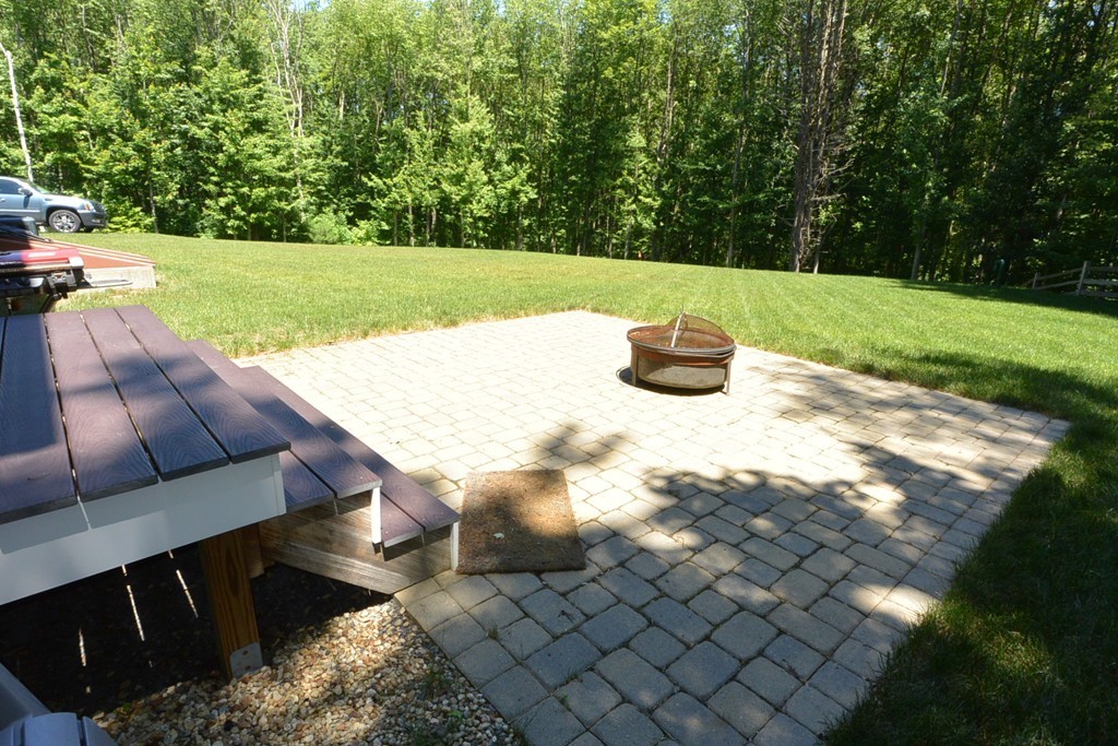 424 Langen Road Lancaster, MA 01523 - Photo 24 of 25 a view of a backyard with sitting area