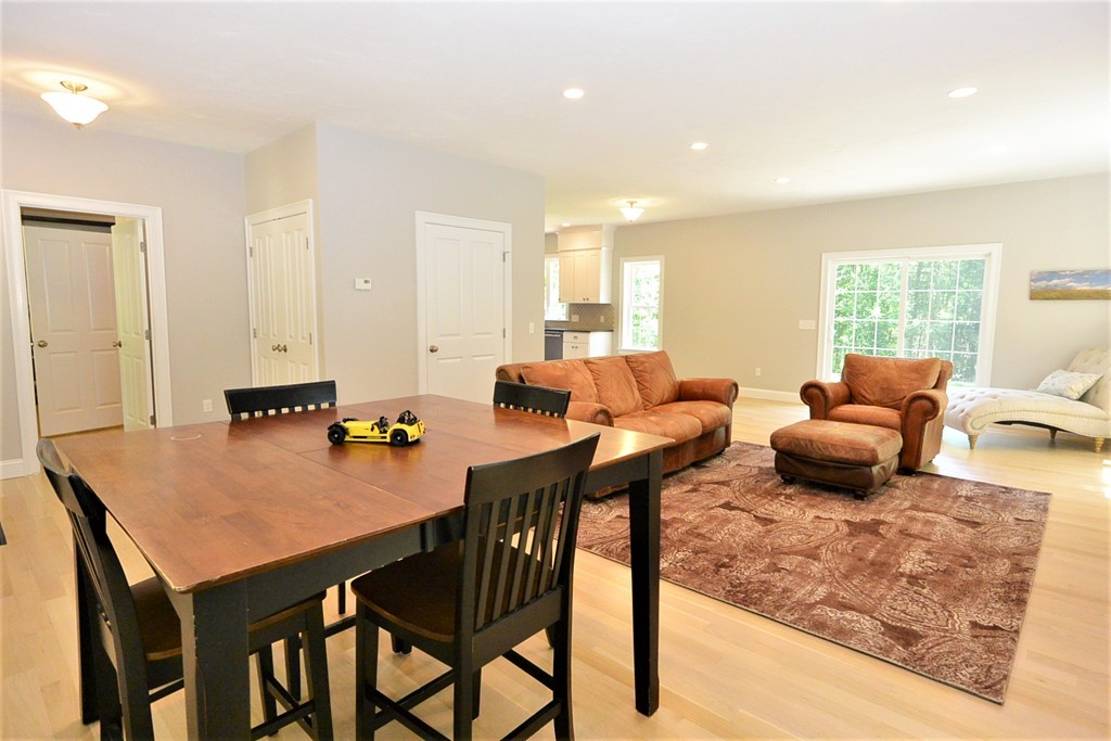 424 Langen Road Lancaster, MA 01523 - Photo 9 of 25 a living room with furniture and a wooden floor
