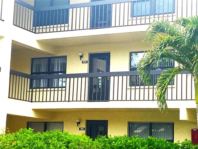 a front view of a house with a porch