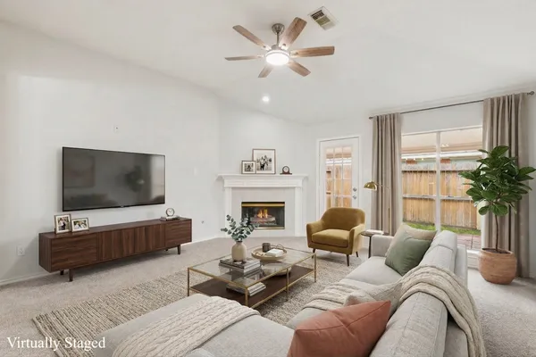 a view of a livingroom with a fireplace
