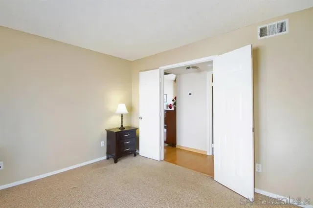 a view of a livingroom with an empty room