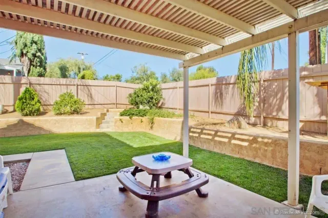 a garden view with a seating space