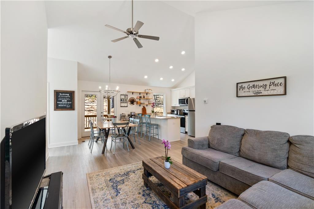 305 Ridgewood Drive Waleska, GA 30183 - Photo 24 of 56 a living room with furniture and a flat screen tv