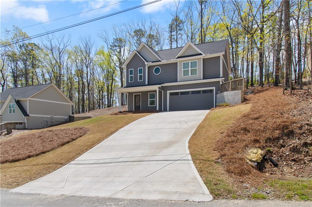 305 Ridgewood Drive Waleska, GA 30183 - Photo 32 of 56 a view of a house with a yard