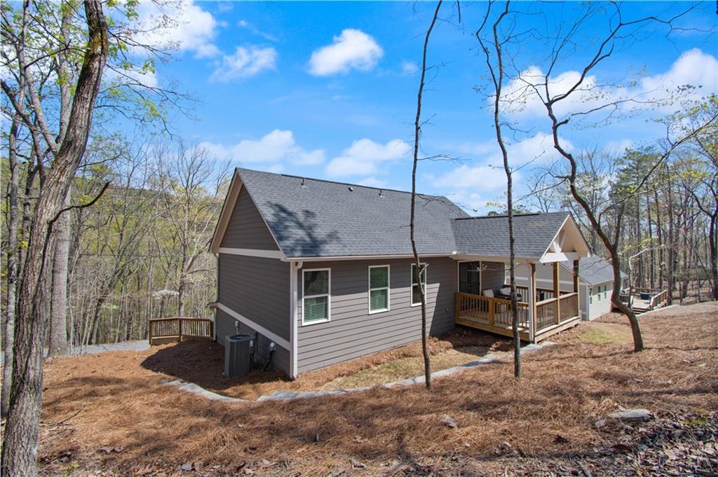 305 Ridgewood Drive Waleska, GA 30183 - Photo 37 of 56 a view of house with a yard