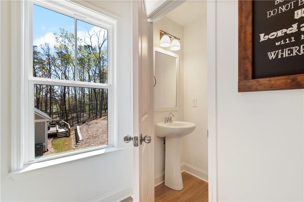305 Ridgewood Drive Waleska, GA 30183 - Photo 9 of 56 a view of a room that has a window and a sink