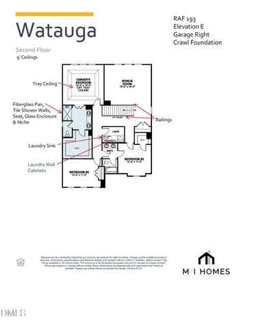 a utility room with a stove and a microwave