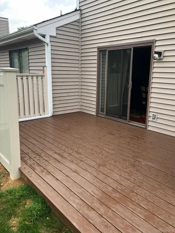 a view of backyard with deck